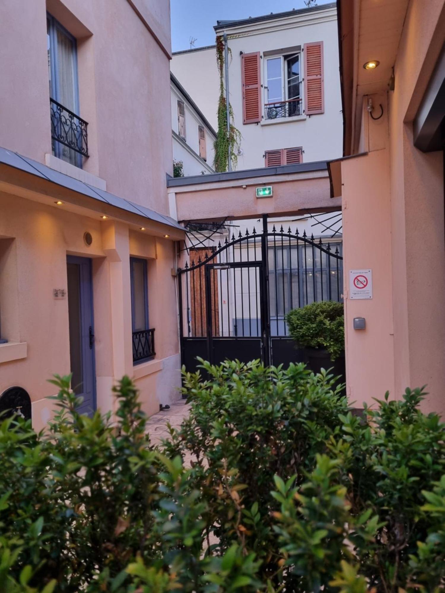 Hotel De L'Horloge Paris Exterior foto