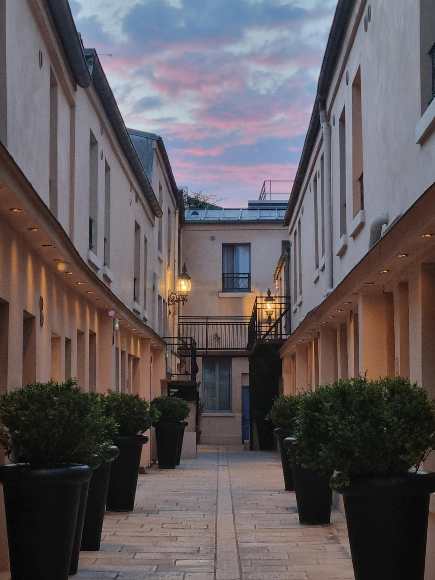 Hotel De L'Horloge Paris Exterior foto